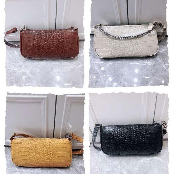

charm2019 bag cowhide year woman crocodile grain single shoulder stick concise portable liquid down package tide