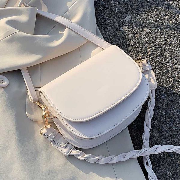 

solid color small saddle bag 2020 new high-quality leather women's handbag weave shoulder strap shoulder messenger bag