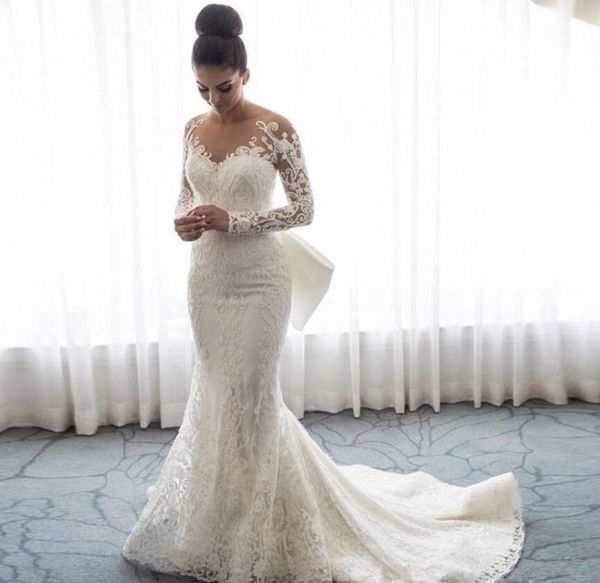 

2018 luxury mermaid wedding dresses sheer neck long sleeves illusion full lace applique bow overskirts button back chapel train bridal gowns, White