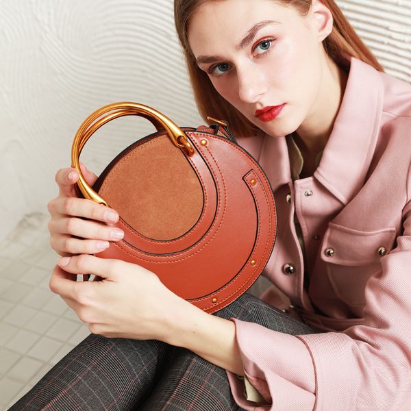 

2020 new european and american ladies messenger bag fashion handbag frosted retro round bag trend small ck handbag 7008