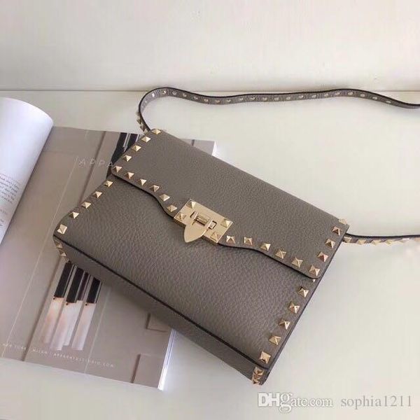 

new fashion leather lady handbag golden rivet bags handle desiigner inspired rivet rockstyd clutec bags gold silver red pink colors
