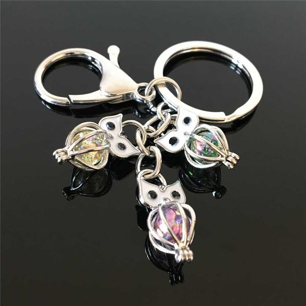 

euro-american owl pearl cage key ring can open hollow noctilucent volcanic stone pendant keyrings, Silver