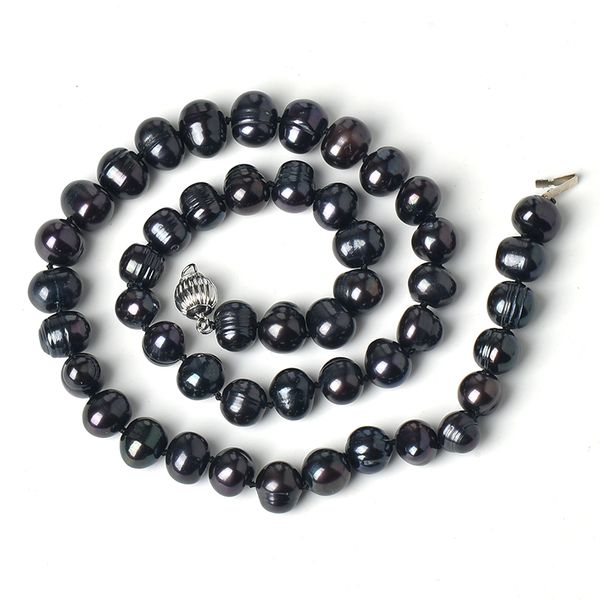 

tiny and regular ellipse 8-9 mm send out full black sheen black pearl necklace .the collocation at the ball, Silver