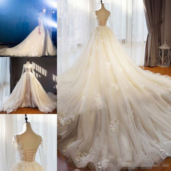 

gorgoues blush pink overskirts wedding dresses long illusion sleeves jewel neck lace applique garden chapel train wedding bridal gown, White