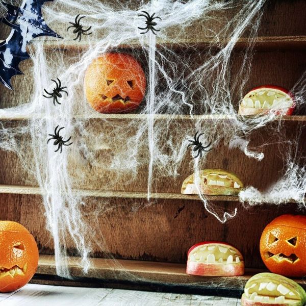

1 Bag of Stretchable Spider Web Webbing Cobweb Halloween Prop + 4 Fake Spiders