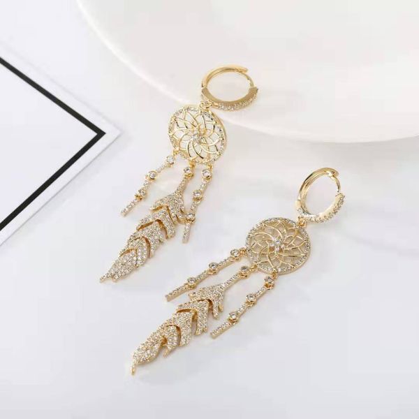 

fashion- and american exaggeration, luxury, temperament, personality, fashion, 925 ear buckles, long thin face, feather, dream net earrings,, Golden
