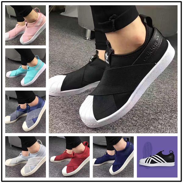 conchas adidas negras con blanco