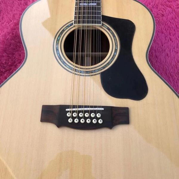 

new 2022 12-string acoustic guitar with spruce finish. rosewood side rear