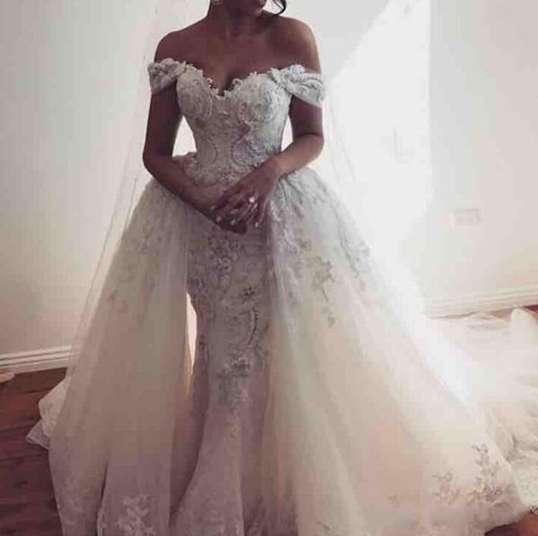 

Over kirt wedding dre e off the houlder lace applique tulle wedding dre with detachable train formal wear country bridal gown