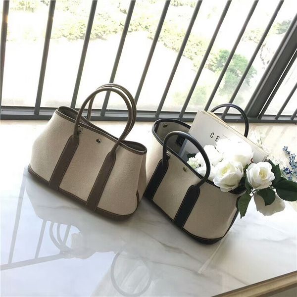 

подлинный женский сад холст matching кожаного коносамент плечо диагональной матери и ребенок сумка