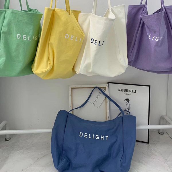 

2019 winter new fashion canvas bag shopping korean large capacity letter printing shoulder portable diagonal wash female handbag