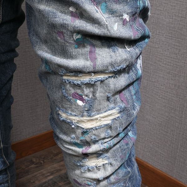 Design per allungamento jeans jeans motociclista adatto per maschi pantaloni da cowboy con rivestimento patch dipinto