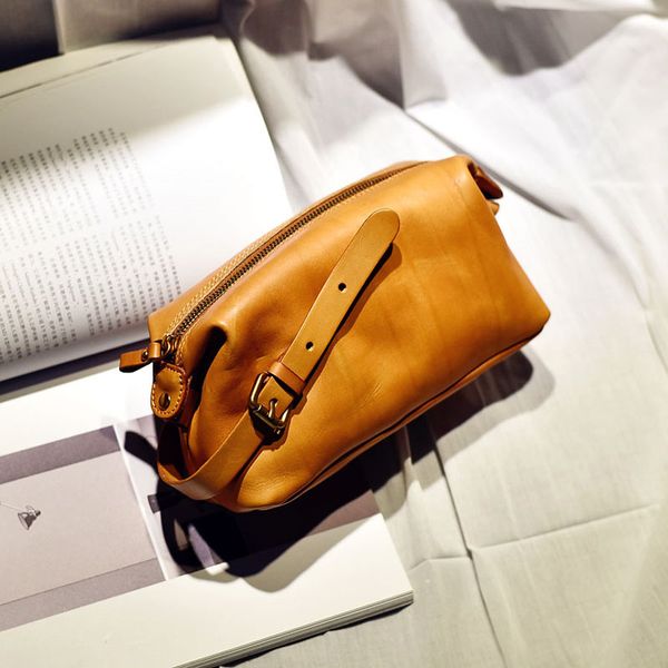 

soft leather makeup handbag female vegetable tanned leather literary retro clutch bag pure wash bag