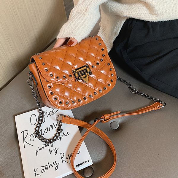 

2019 new bag women ling ge fashion riveting nail shoulder/crossbody