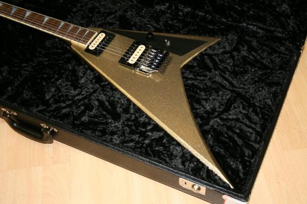 

jack first five 30th anniversary randy rhoads gold metal flake sparkle flying v electric guitar reverse shark fin inlays, floyd rose tremolo