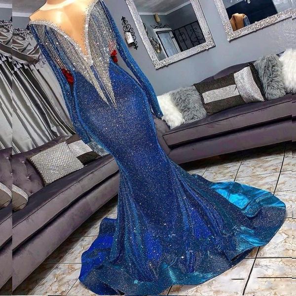 Glitzernde blaue Meerjungfrau-Abschlussballkleider, transparenter Ausschnitt, silberne Quaste, lange Ärmel, Pailletten-Abendkleider, günstiges formelles Partykleid 2019–2020