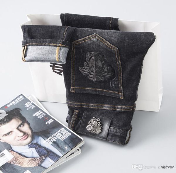 

mens designer fashion dark blue mens designer jeans embroidered women head men jeans slim hip hop pencil jeans 5er