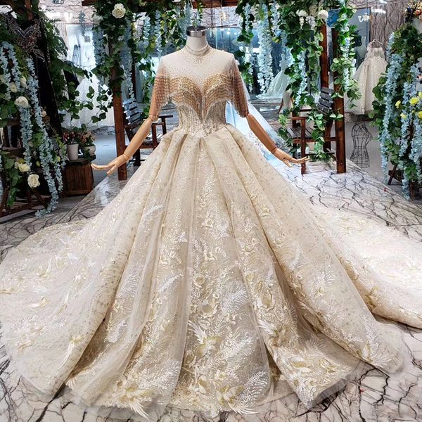 

2019 последние свадебные платья в дубае грудь из бисера иллюзия блестки жемчужина с высоким вырезом и рукавами из тюля открытая замочная скв, White