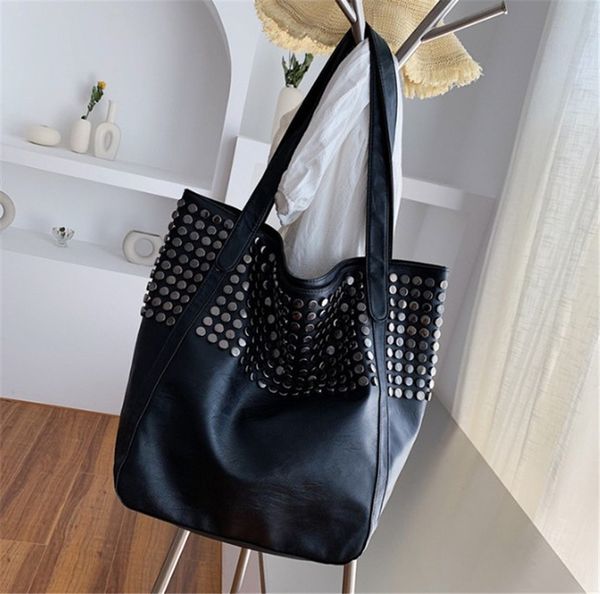 

fashionable rivet large capacity shopping bag fashionable lady carry large bag on one shoulder //ph-cfy20041020