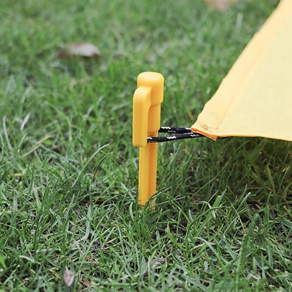 

10pcs camping tools plastic tent pegs nails sand ground stakes outdoor camping tent awning yellow tent accessories tents and shelters