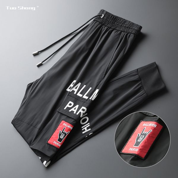 

2020 mens letter printing jogger pants black drawstring sports pants fashion designer joggers ribbon personality casual trousers