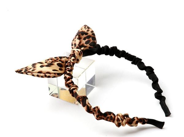 

бесплатная доставка женская мода прекрасный леопардовый узел лук тонкий hairband девушки корейский головной убор леди элегантный аксессуары
