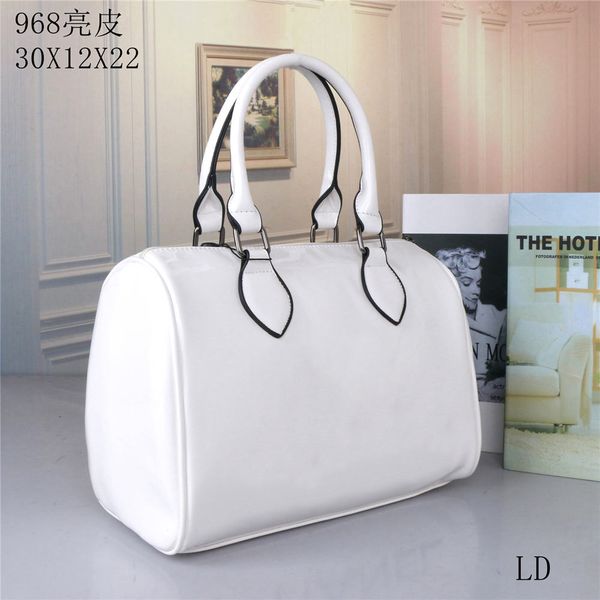 

designer luxury handbags purses cow-boy with brand handbags hand bag and cross bags two kinds of joker nice bright skin large capacity