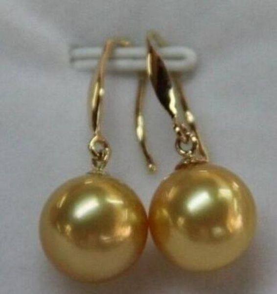 

beautiful 10-11mm round natural south sea gold earrings and pearls 14k, Golden
