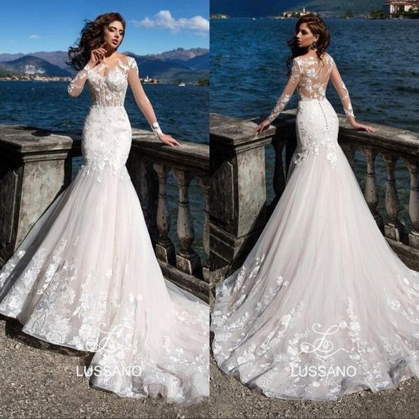 

2019 gorgeous mermaid wedding dresses sheer neck illusion long sleeves lace appliques court train beach bridal gowns, White