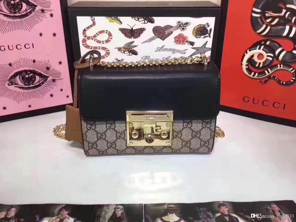 

Высококачественная дизайнерская кожаная дамская сумочка с металлической цепочк