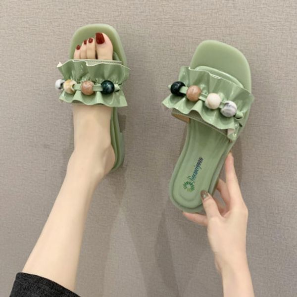 

2020 summer new flat bottom low-heeled flat heels wear a word drag beaded student female sandals wild female slippers tide, Black