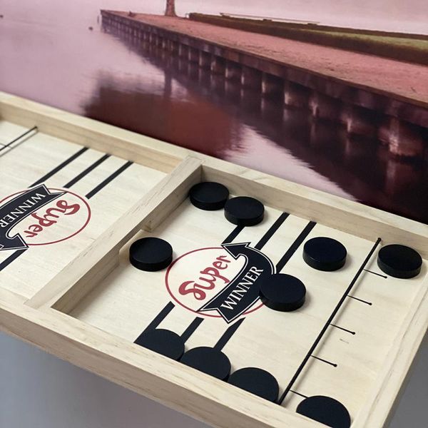 

table board board-game fast hockey game paced sling puck play family games y200414