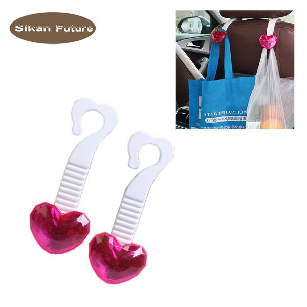 

sikan,a practical car ornament for the back hook of the seat of a peach heart type car