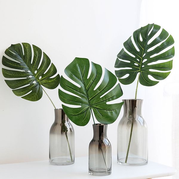 

12pcs large artificial fake monstera palm tree leaves green plastic leaf wedding diy decoration flowers size leaves plant