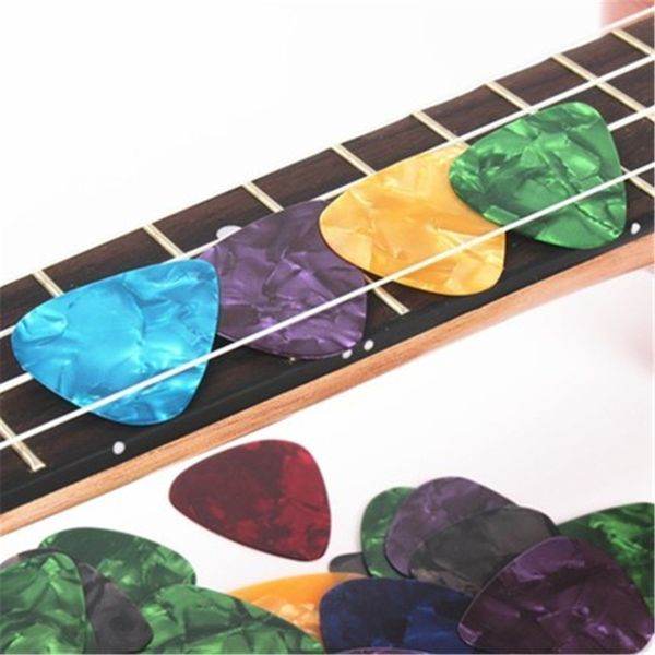 

100pcs/lot celluloid guitar picks plectrums standard/triangle 0.38mm-0.8mm for acoustic and electric guitar bass guitarra pick