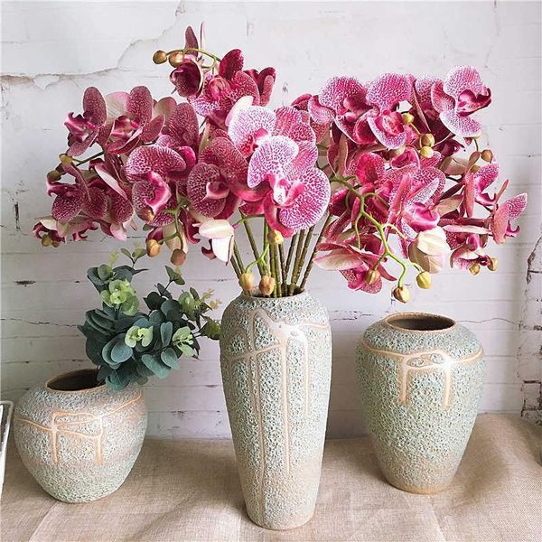 

1 комплект = 7 цветов отрасли +3 orchid стеблями, бабочки орхидеи искусственные цветы главная свадебные украшения флорес fleur artificielle