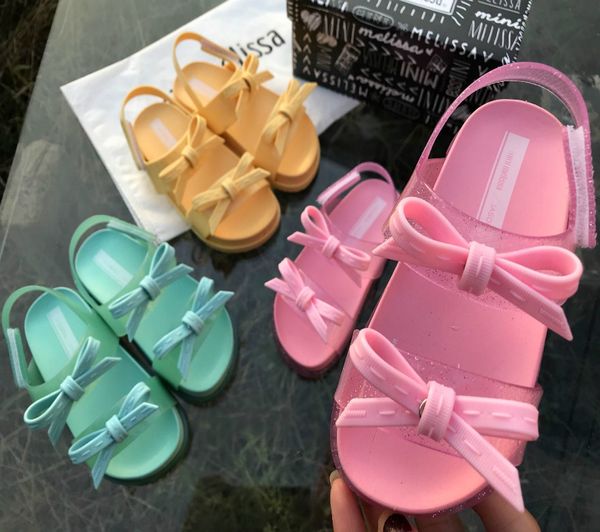 

explosion models new solid color bow children's comfortable sandals girls baby bow double pole thick bottom beach jelly s, Black;red