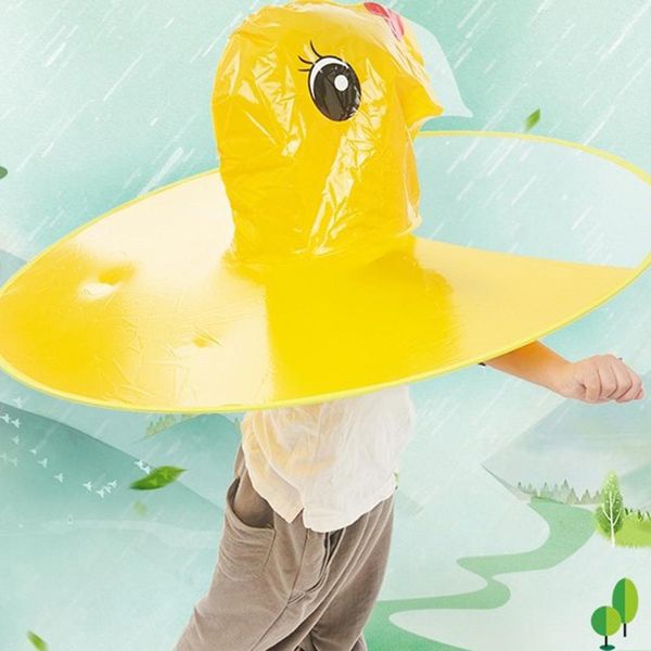 

new fashion lovely duck ufo cloak pvc umbrella hat kids student raincoat
