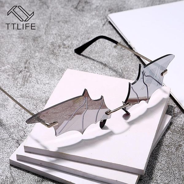 

ttlife прохладный творческий batwing солнцезащитные очки тенденция очки женщины мужчины rimless vintage очки trend ladies открытый солнцезащ