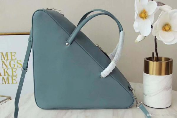 

european classic luxury style, ladies handbag, triangle handbag, solid leather zipper seal, paris model show, perfect packaging