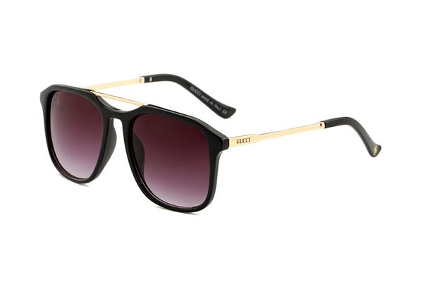 gafas gucci doradas