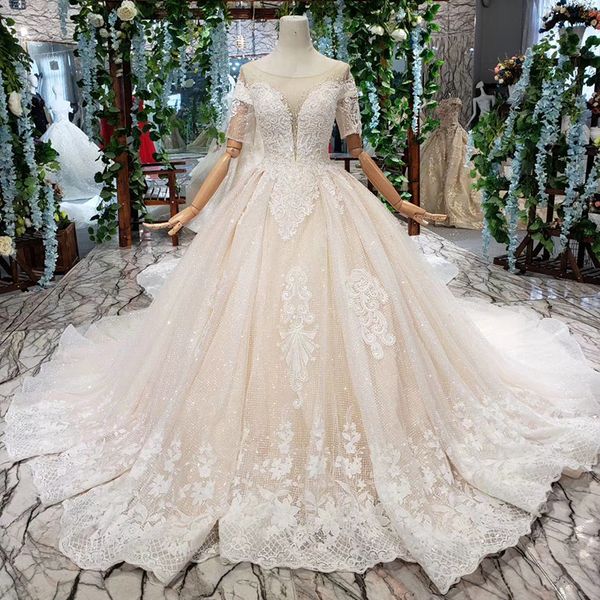 

2019 latest lebanon wedding dresses short sleeve illusion o neck open keyhole lace up back sequins applique pattern crystal bridal gowns, White