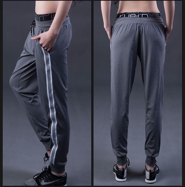 

womens srts dgner pans yga lens tusr f taig mie letr prited pants running fitess tights pants, Black;blue