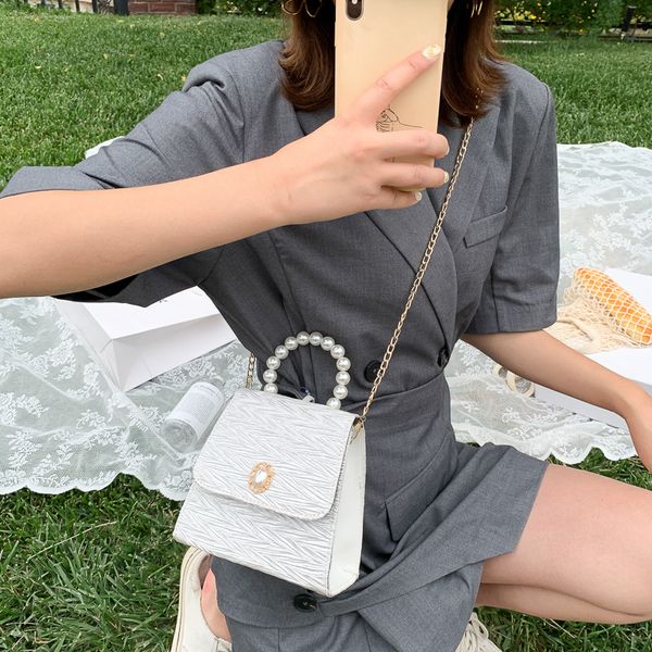 

2020 new ladies shoulder bag fashion fold pearl portable armpit bag korean chain texture crossbody