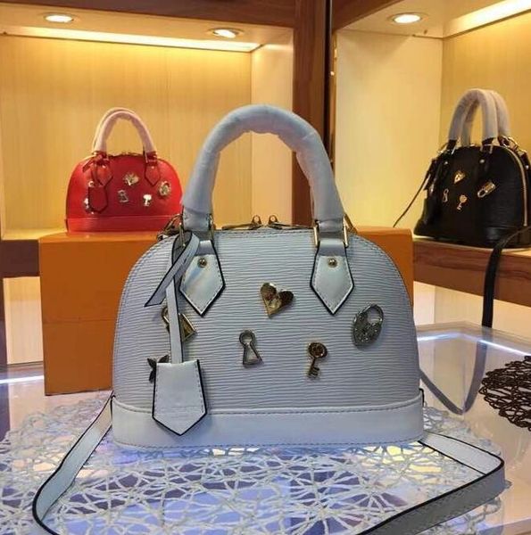 

реальная кожа женщины love lock bb сумки повелительницы вскользь классические сумки shell кошелек 23x17x11