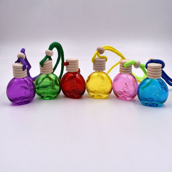 

Whole ale 10ml gla wi hing bottle pendant air fre hener hanger car hanging ornament perfume diffu er bottle car tylin