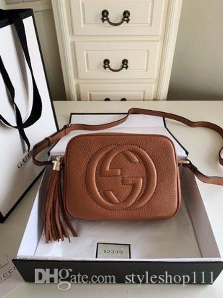 

womenbag compact shoulder bag with a leather tassel zipper pull. luxury style leather handbag handbag soho small leather disco