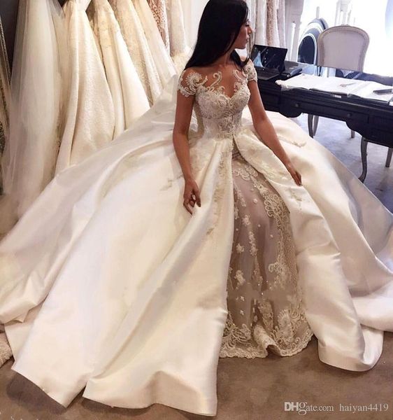 

2020 new mermaid wedding dresses jewel neck lace appliqued crystal beading cap sleeves detachable train overskirts formal bridal gowns, White