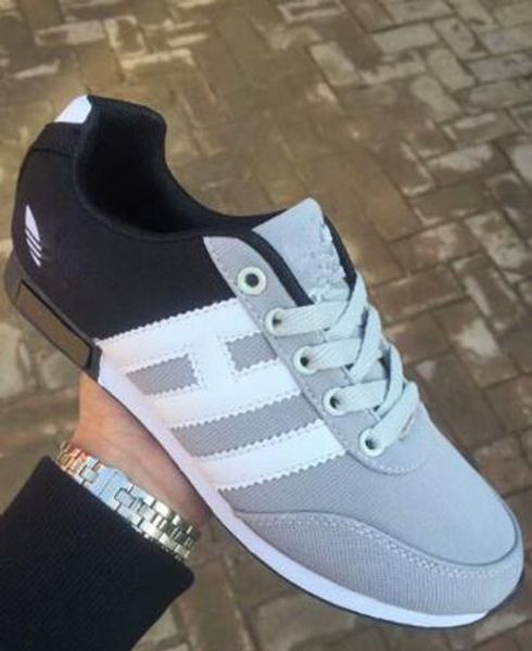 

2020 sell fashion casual flat shoes men and women cortez shoes leisure shells shoes leather fashion outdoor sneakers, Black