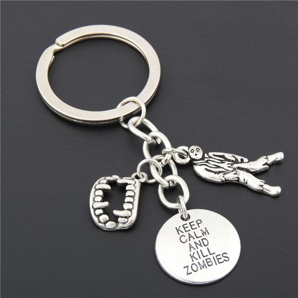 

keep calm and kill zombies letter tag pistol cowboy hat tooth zombie charm keychain personality creative men women jewelry friend gift, Slivery;golden